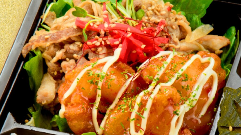 エビチリ・豚の生姜焼き・鶏そぼろ&玉子そぼろご飯メガ幕の内弁当